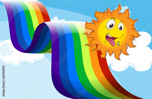 A rainbow beside the happy sun