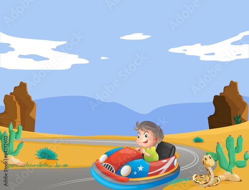 A young boy travelling at the desert