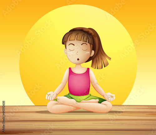A young lady doing yoga