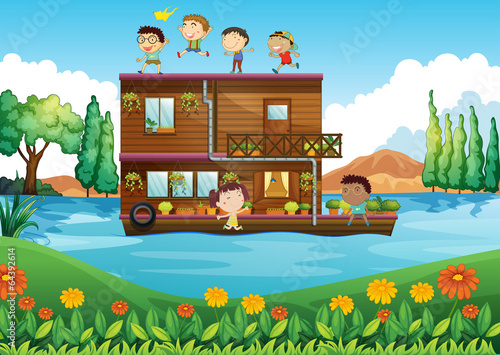 A wooden house in the middle of the river with kids