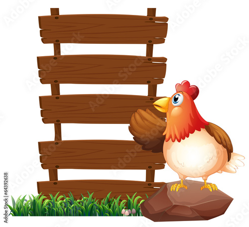 A hen beside the empty signboards