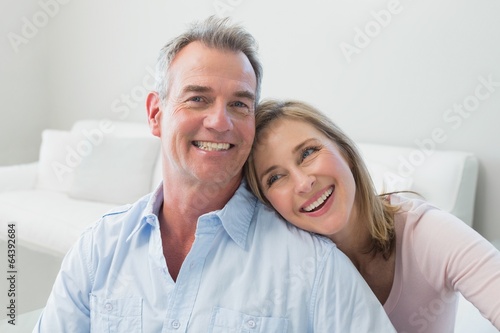 Portrait of a loving couple in the living room