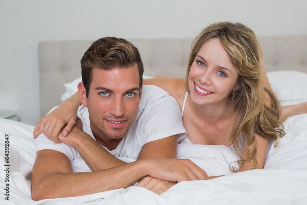 Close-up of a loving couple lying in bed Close-up of a loving couple lying in bed