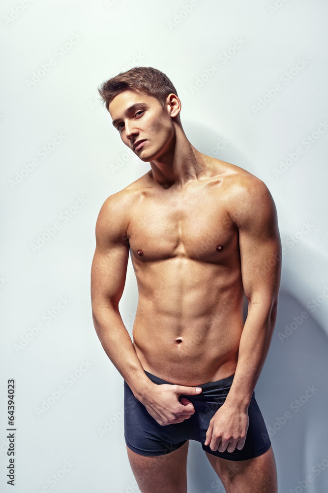 Fototapeta premium Portrait of a young sexy muscular man