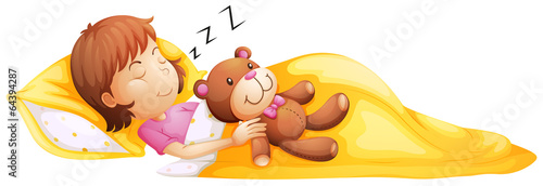 A young girl sleeping with her toy
