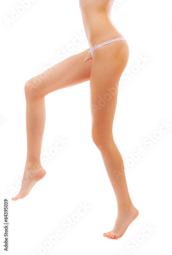 Female legs on a white background.