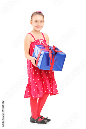 Young girl holding a wrapped present