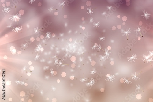 Digitally generated dandelion seeds on pink background