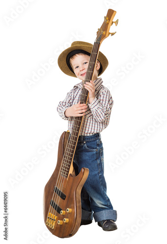 Little boy standing with rock guitar