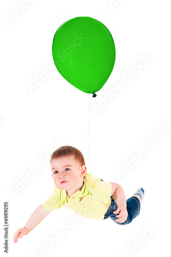 smiling child flying on a balloon photo