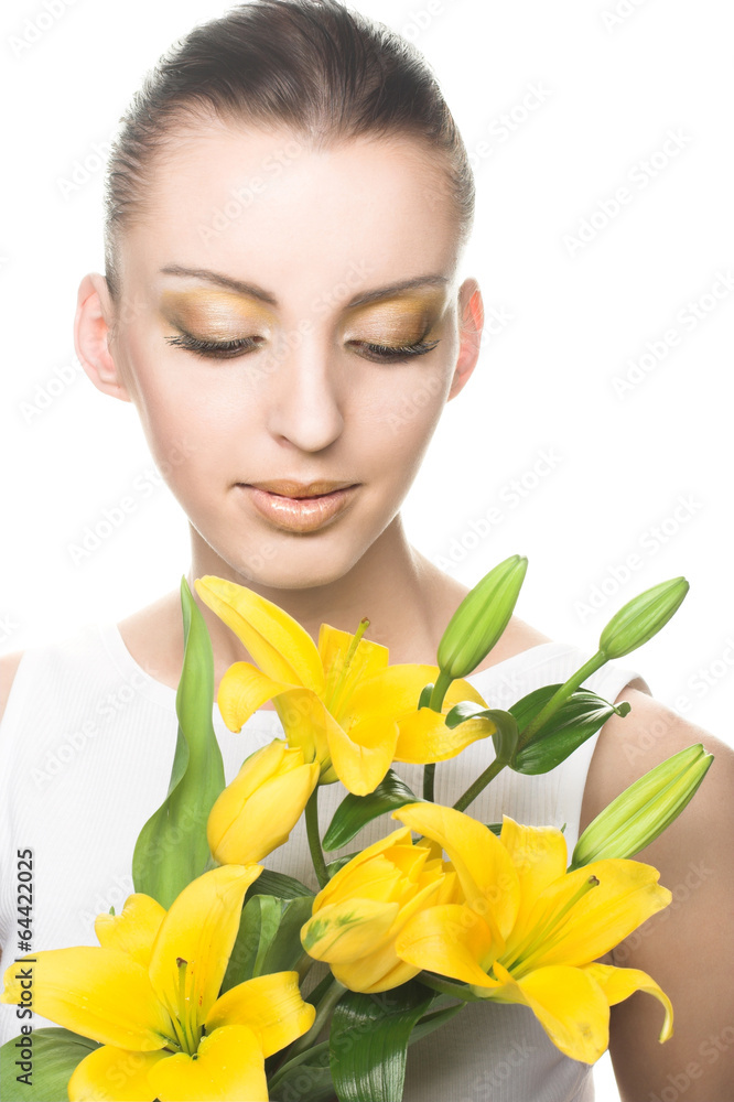 Young woman with yellow flowers Young woman with yellow flowers