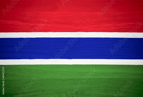 Gambia flag on wood texture © PinkBlue