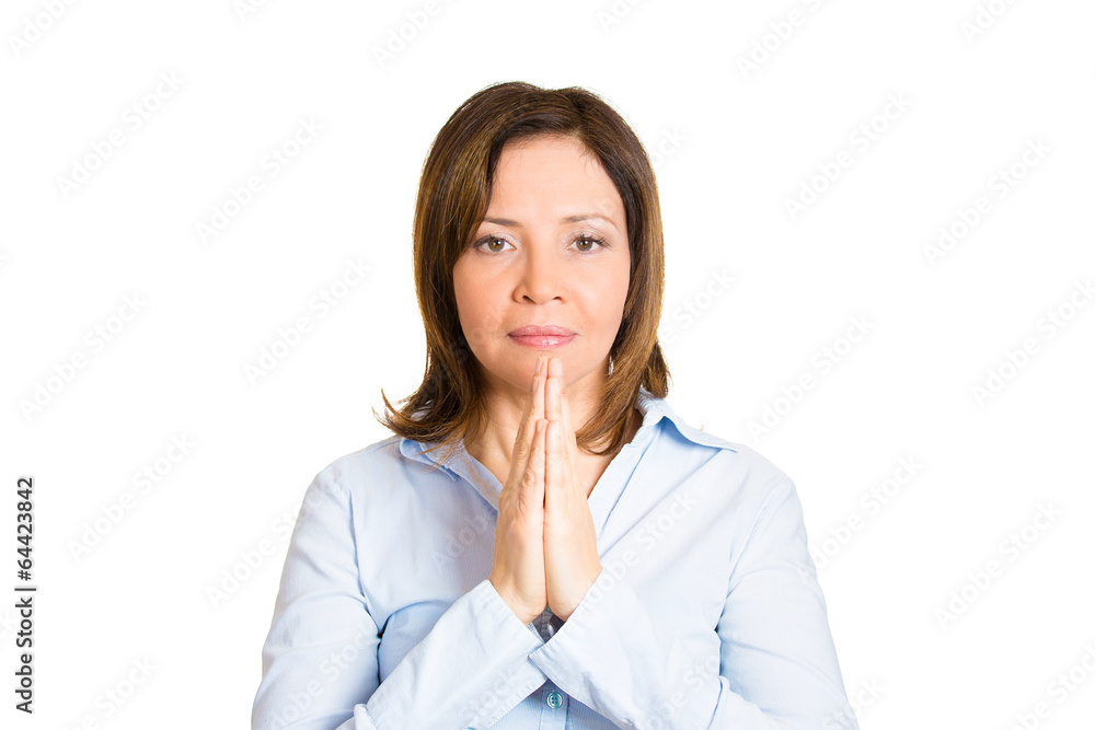 Portrait hopeful middle aged woman praying, asking for help Portrait hopeful middle aged woman praying, asking for help