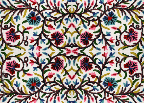 .Bright embroidered bedspread