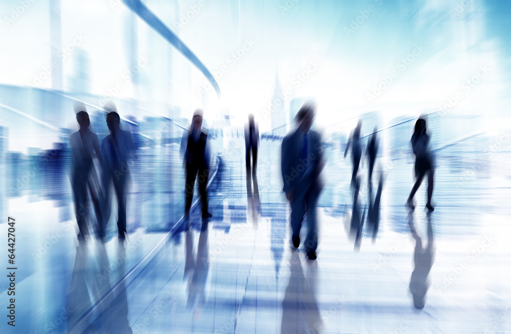 Silhouettes of Business People in Blurred Motion Walking Silhouettes of Business People in Blurred Motion Walking