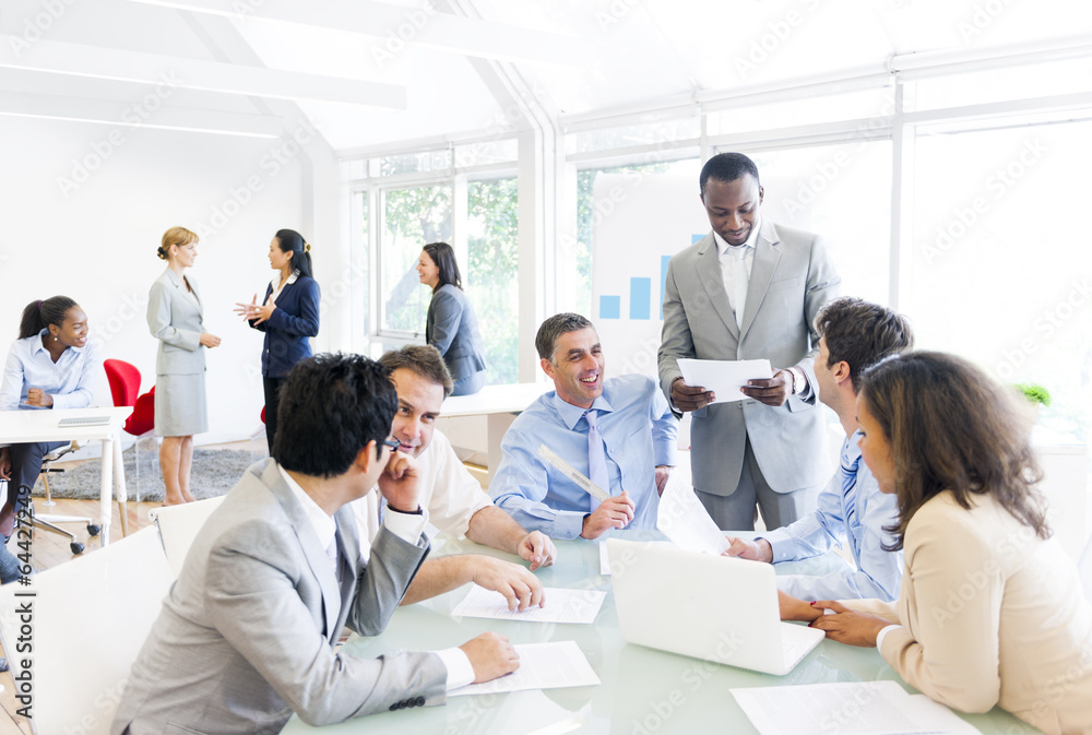 Group of Business People around Conference Table