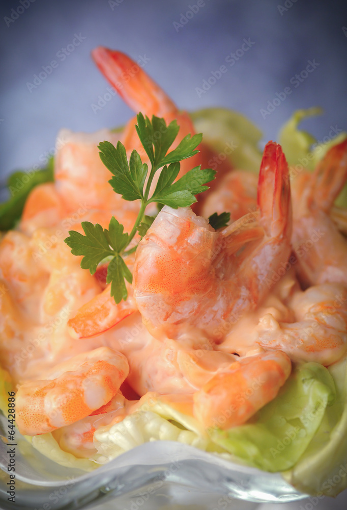Closeup shrimp cocktail in pink sauce with salad Closeup shrimp cocktail in pink sauce with salad