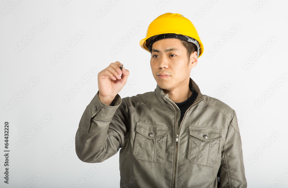 construction worker writing notes