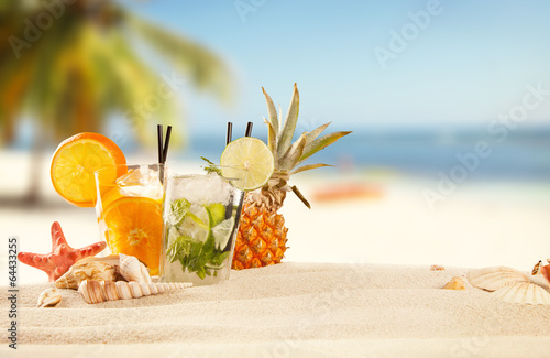 Summer beach with drinks and accessories