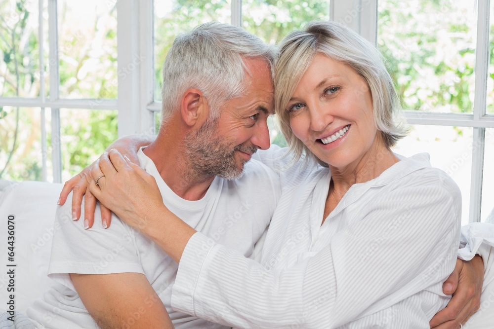 Loving happy mature couple with arm around Loving happy mature couple with arm around