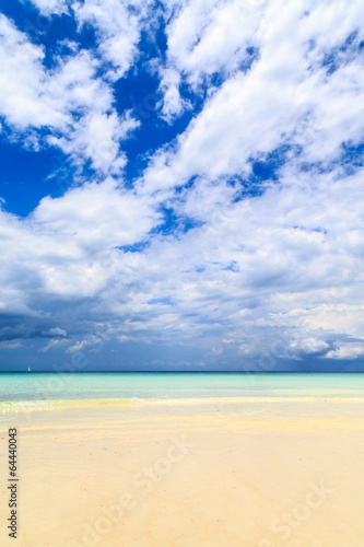 Dark storm clouds above a deserted beach © pwollinga
