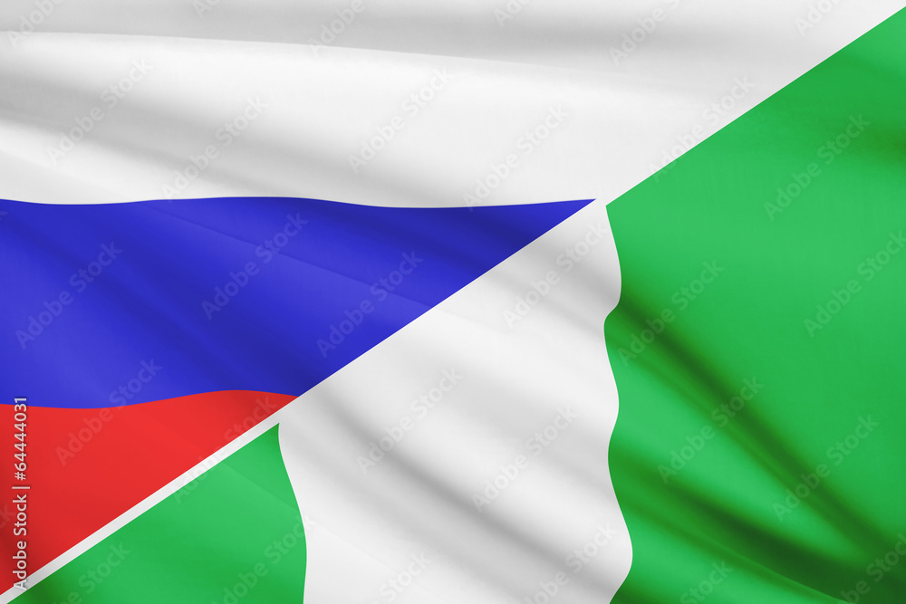 Fototapeta premium Series of ruffled flags. Russia and Federal Republic of Nigeria.