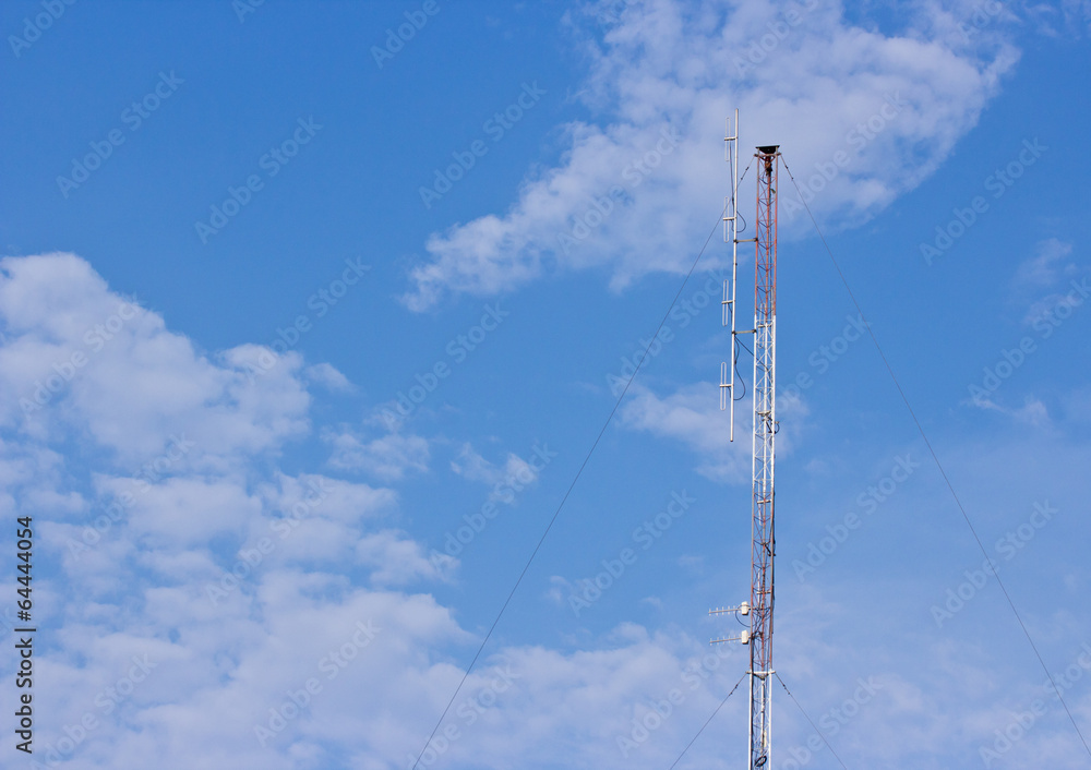 Telecommunication signal tower on blue sky Telecommunication signal tower on blue sky