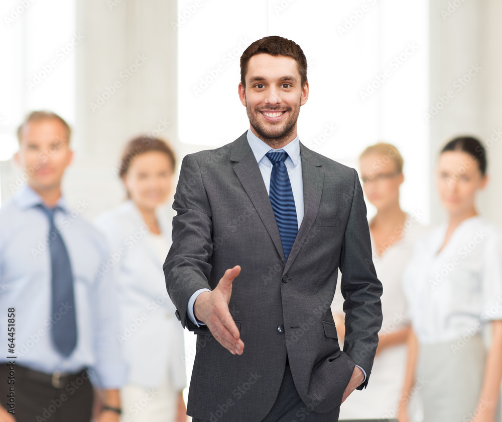 businessman with open hand ready for handshake businessman with open hand ready for handshake