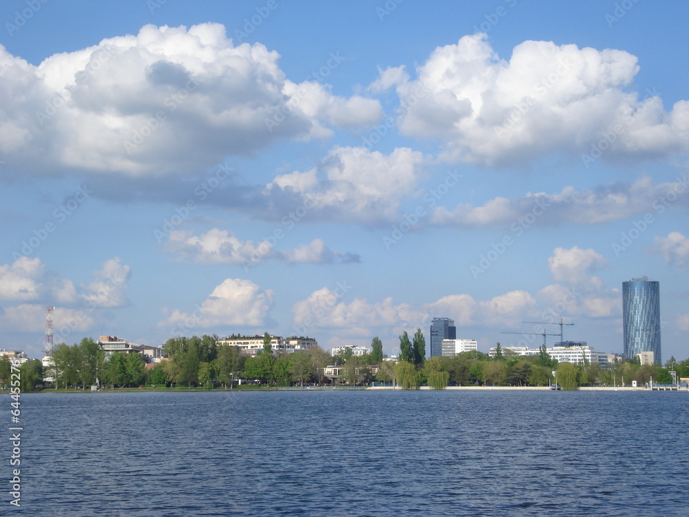 View of office buildings over Herastrau lake in Bucharest