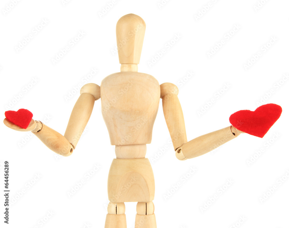 Wooden mannequin holding red hearts isolated on white Wooden mannequin holding red hearts isolated on white