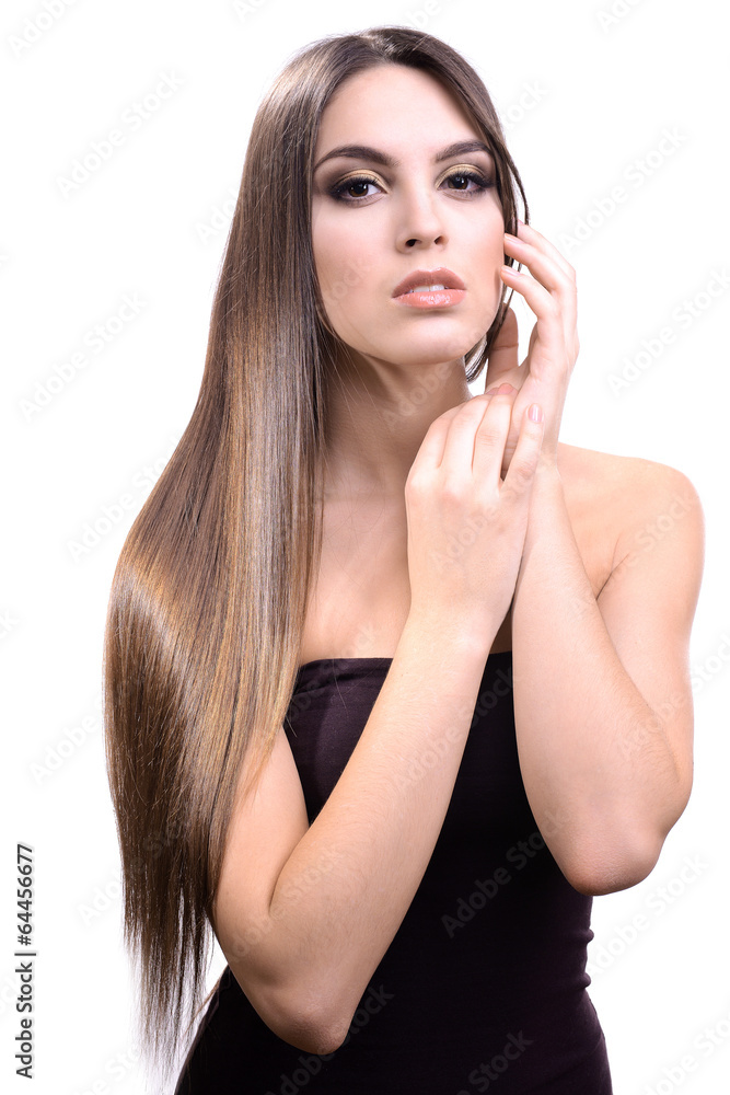 Beautiful young woman with long hair isolated on white Beautiful young woman with long hair isolated on white