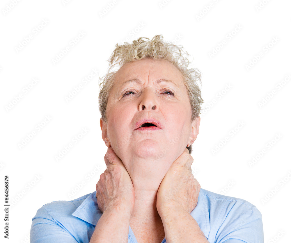 Headshot senior elderly woman with neck pain on white background Headshot senior elderly woman with neck pain on white background