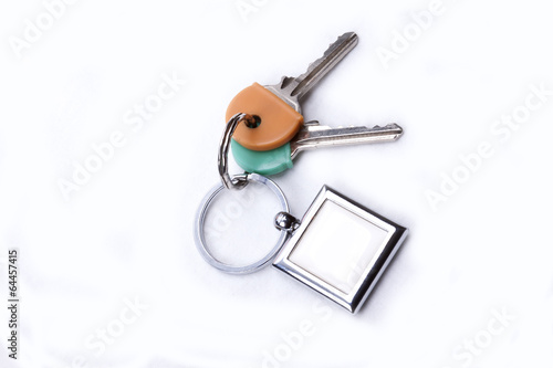 A bunch of keys with a key ring, isolated on a white background