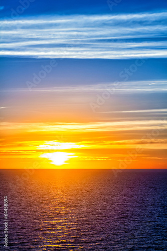 Colorful sunset over sea water