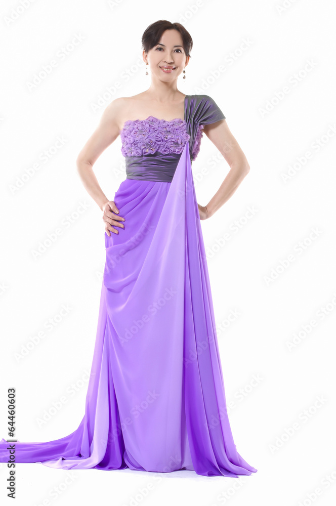female fashion model posing in purple dress