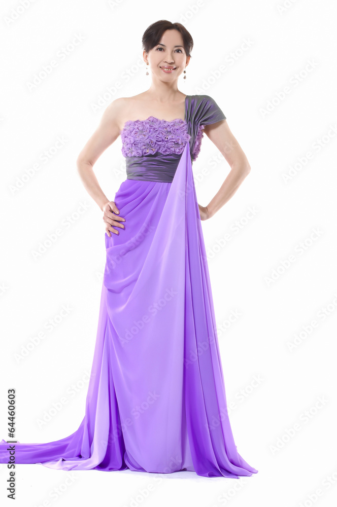 female fashion model posing in purple dress female fashion model posing in purple dress