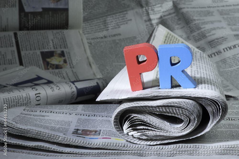 Word PR on newspaper - obrazy, fototapety, plakaty 