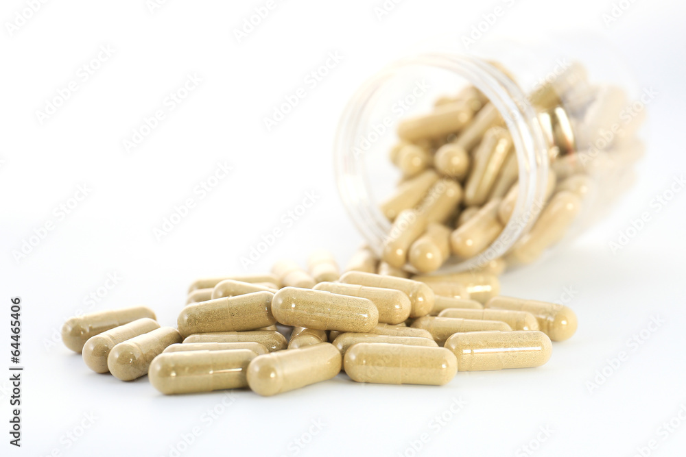 closeup of pills isolated on white background closeup of pills isolated on white background