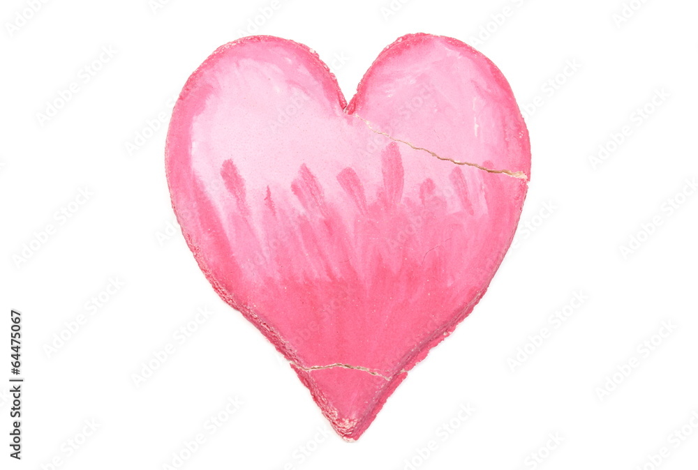 Valentine broken heart of salt dough on white background