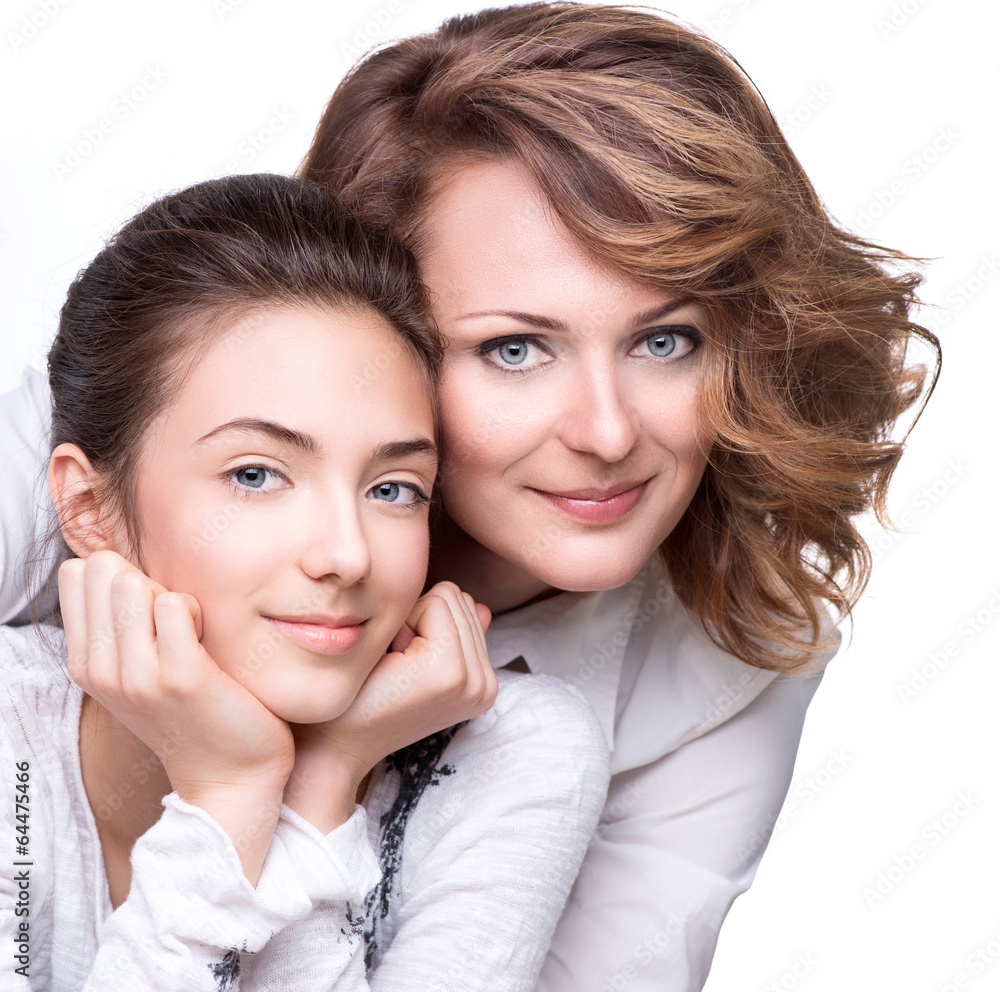 Attractive happy mother and smiling teenage daughter Attractive happy mother and smiling teenage daughter