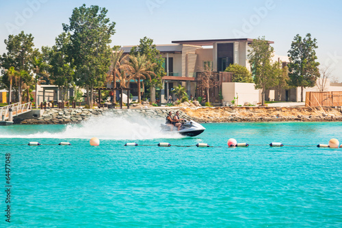 Couple on the jetski ride in Abu Dhabi, UAE photo