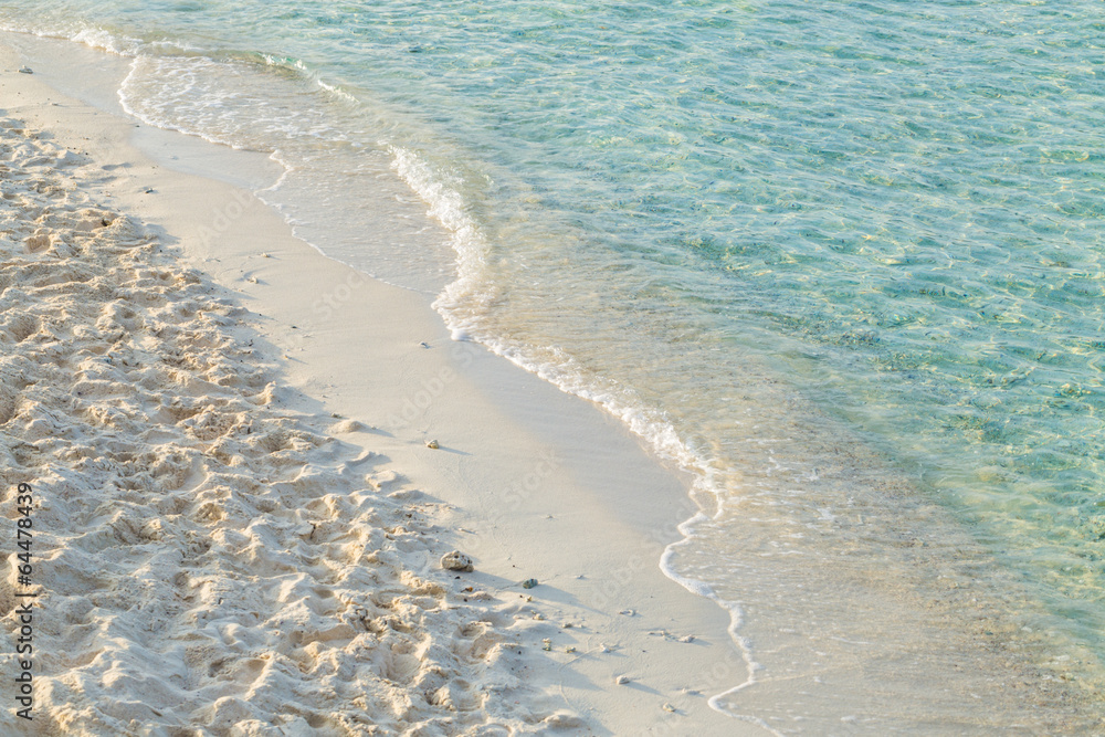 Soft wave of the sea on the sandy beach Soft wave of the sea on the sandy beach