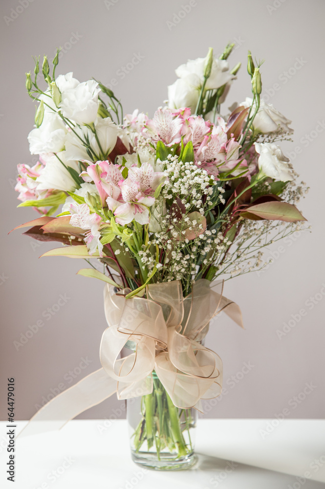flowers in vase on table flowers in vase on table