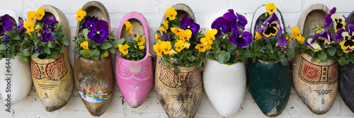 Photography Dutch wooden clogs with flowers