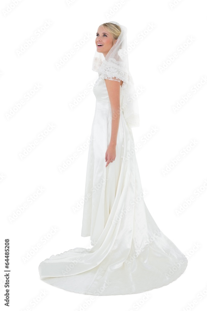 Surprised woman in wedding dress over white background Surprised woman in wedding dress over white background