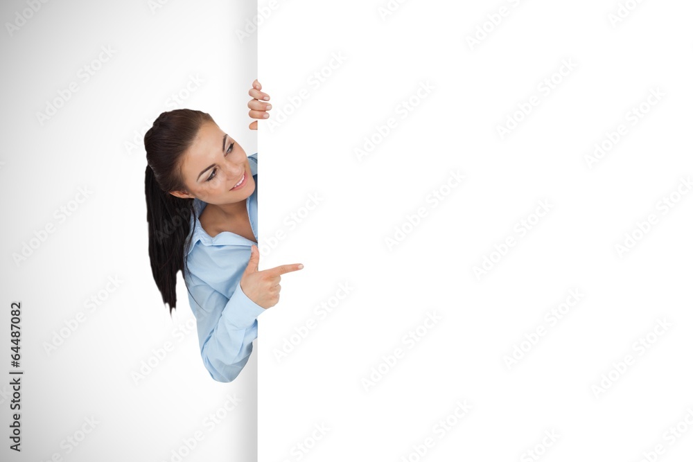 Composite image of businesswoman showing card Composite image of businesswoman showing card