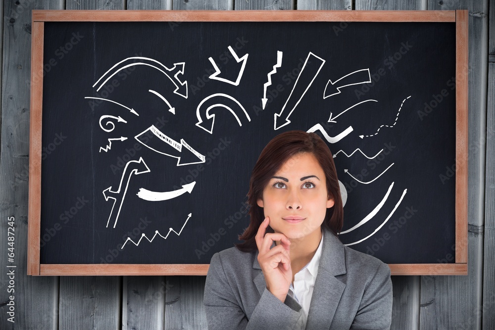 Composite image of smiling thoughtful businesswoman