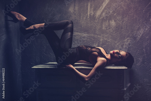 Studio fashion portrait of young sexy woman