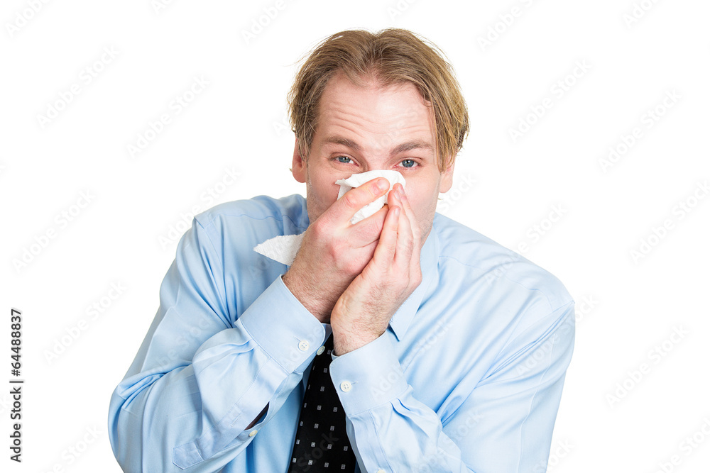 Sick man, blowing his runny nose, having allergy Sick man, blowing his runny nose, having allergy