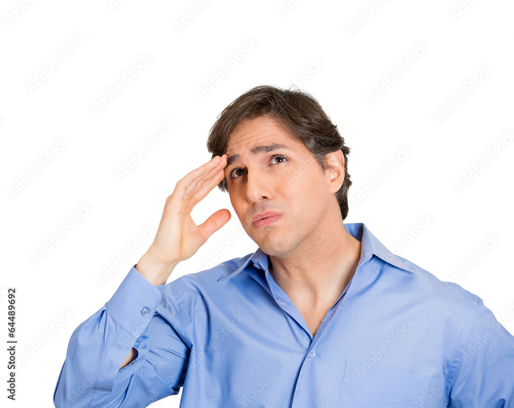 Portrait tired and stressed out man looking up thinking Portrait tired and stressed out man looking up thinking